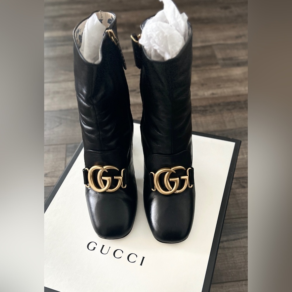 Authentic Gucci Victorie Black Leather Ankle Boots in original box w dust bags.